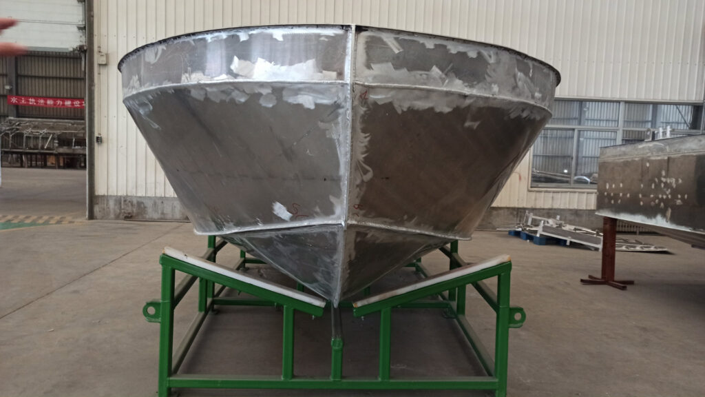Modern aluminum boat on the water, showcasing metal boats as a durable and reliable boat building material.